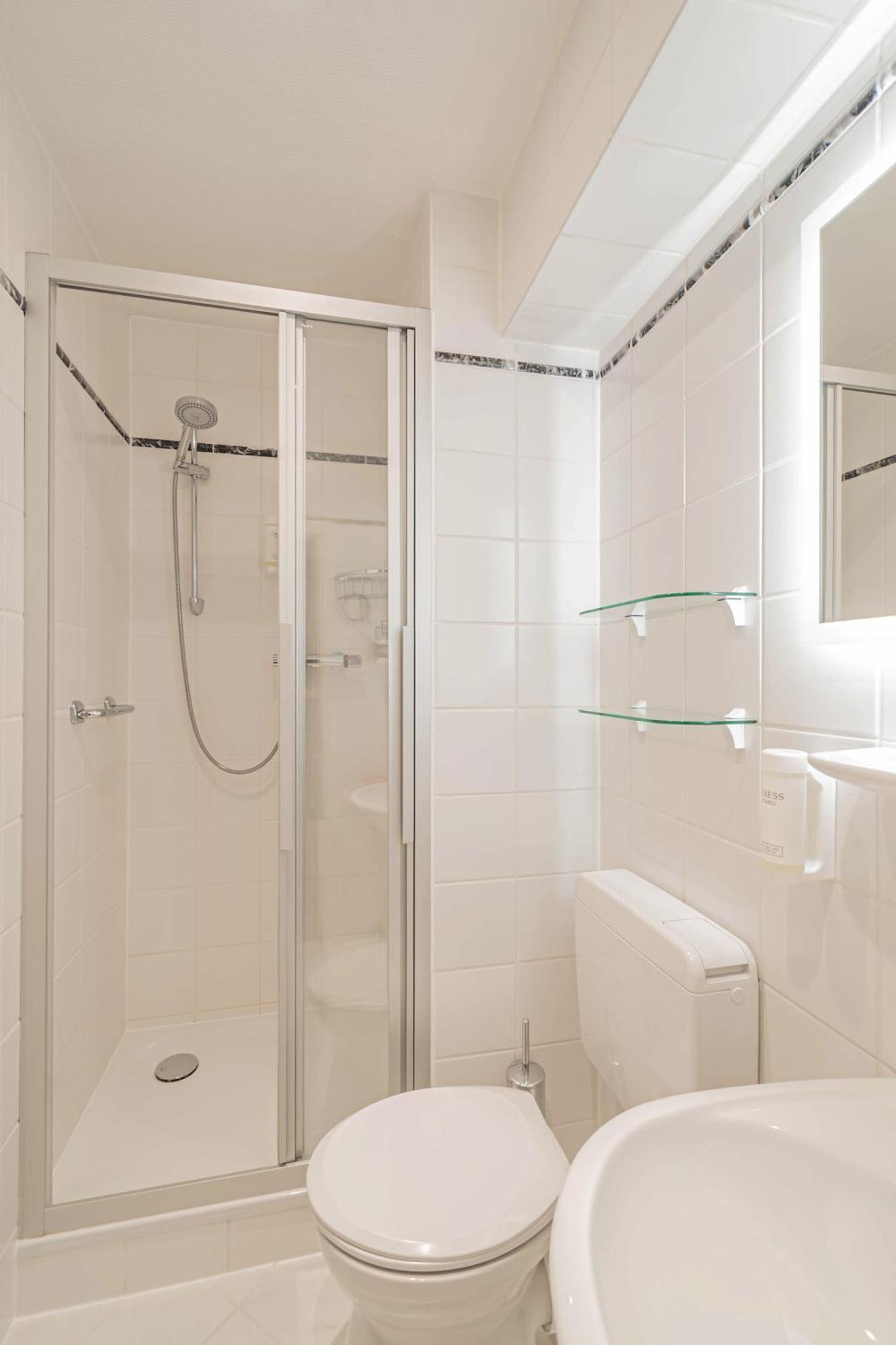 Hotel Villa Am Kurpark Бад-Хомбург-фор-дер-Хёэ Номер фото